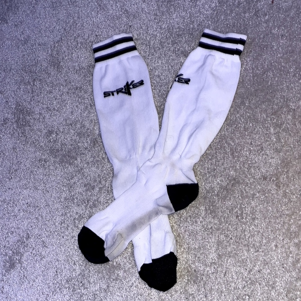 Striker white and black socks about a medium, don’t know the actual size
